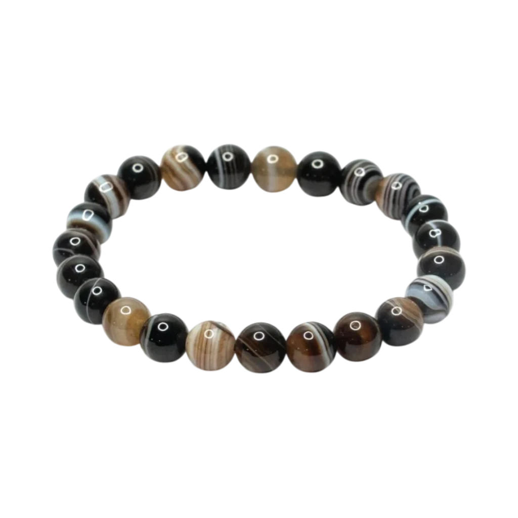 Sulemani Hakik bracelet with black, brown, and white crystals on a white background