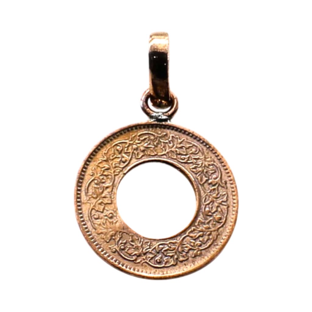 copper pendant with intricate design on a white background