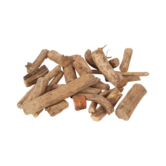 Pile of vidhara root jadi on a white background