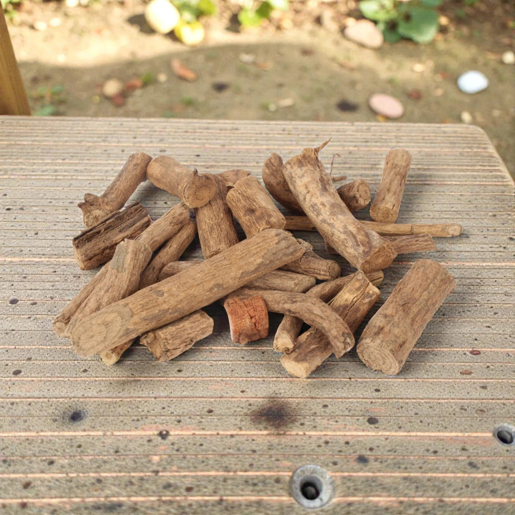 vidhara jadi on a wooden surface outdoors