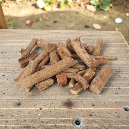 vidhara jadi on a wooden surface outdoors