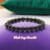 Black Onyx Bracelet on a purple pillow